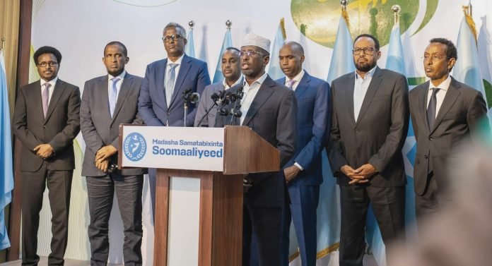 Somali opposition alliance Madasha Samatabixinta leaders, including former President Sheikh Sharif Sheikh Ahmed and two former Prime Ministers, during a press conference in Mogadishu.
